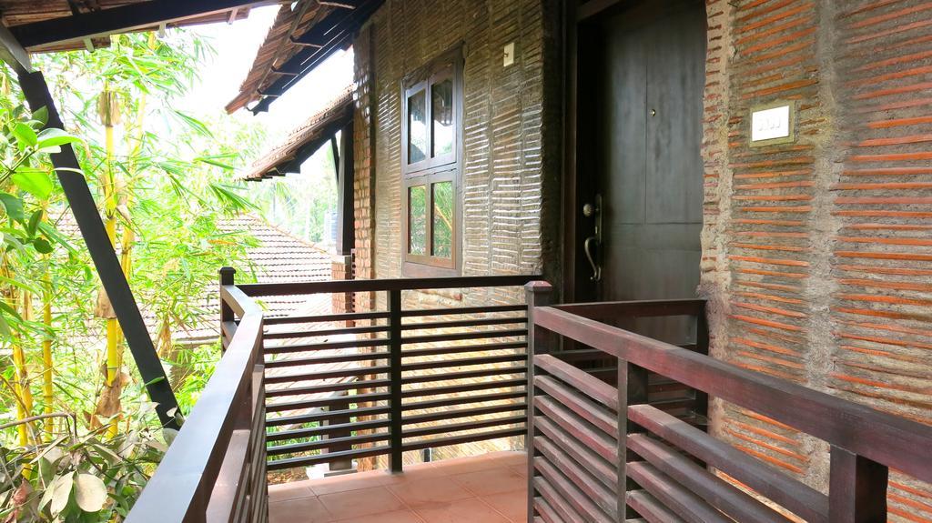 Clayfingers Art Cottage Thrissur Номер фото
